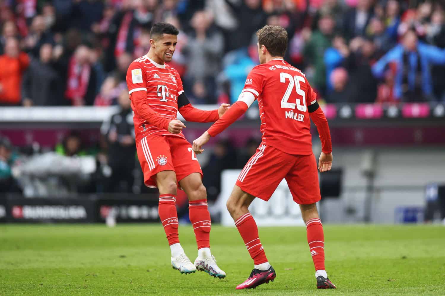 Thomas Müller und Joao Cancelo